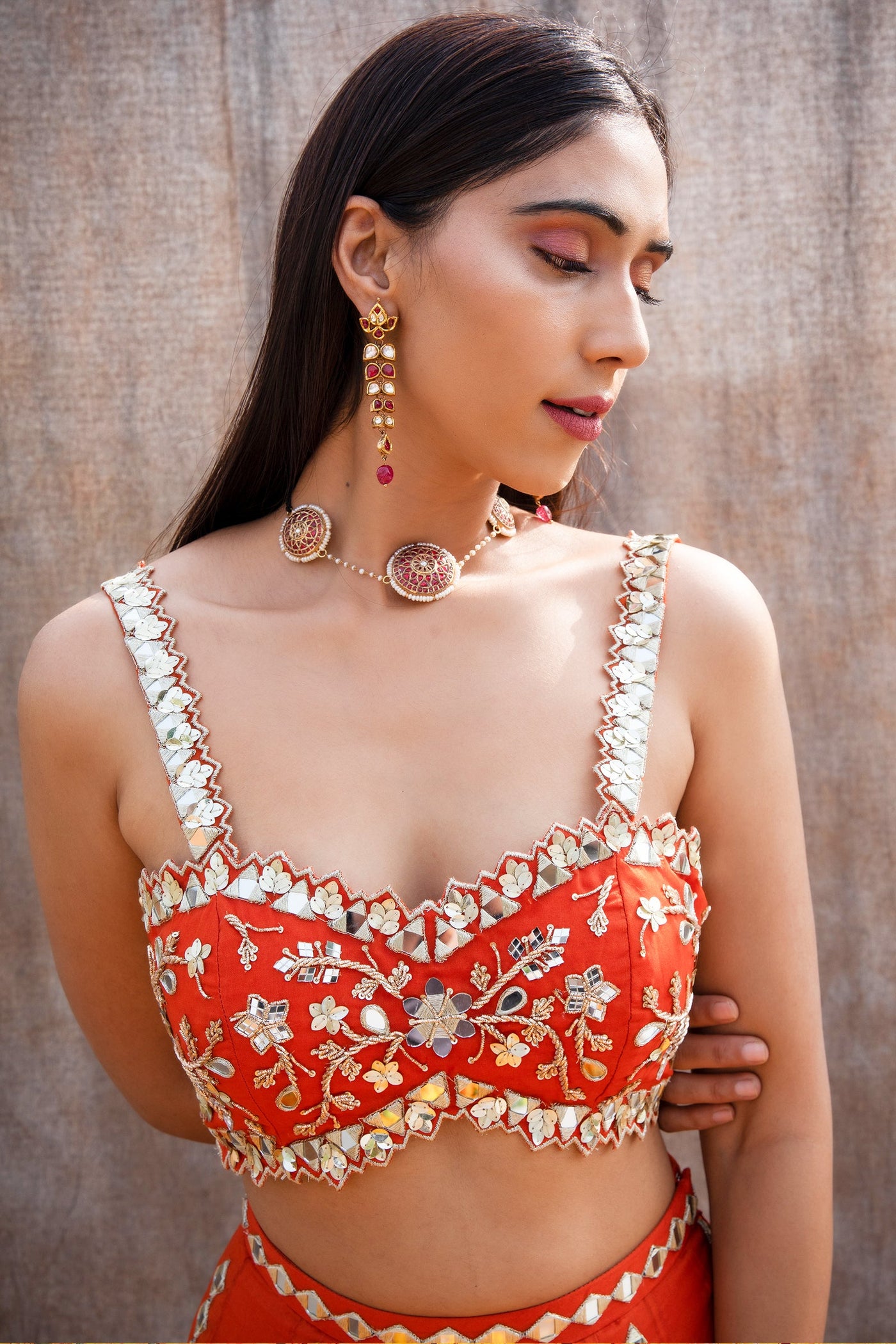 Riya Jain in Mirror Work V-Hem Bustier With High Waist Mirror Lines Lehenga And Embroidered Dupatta