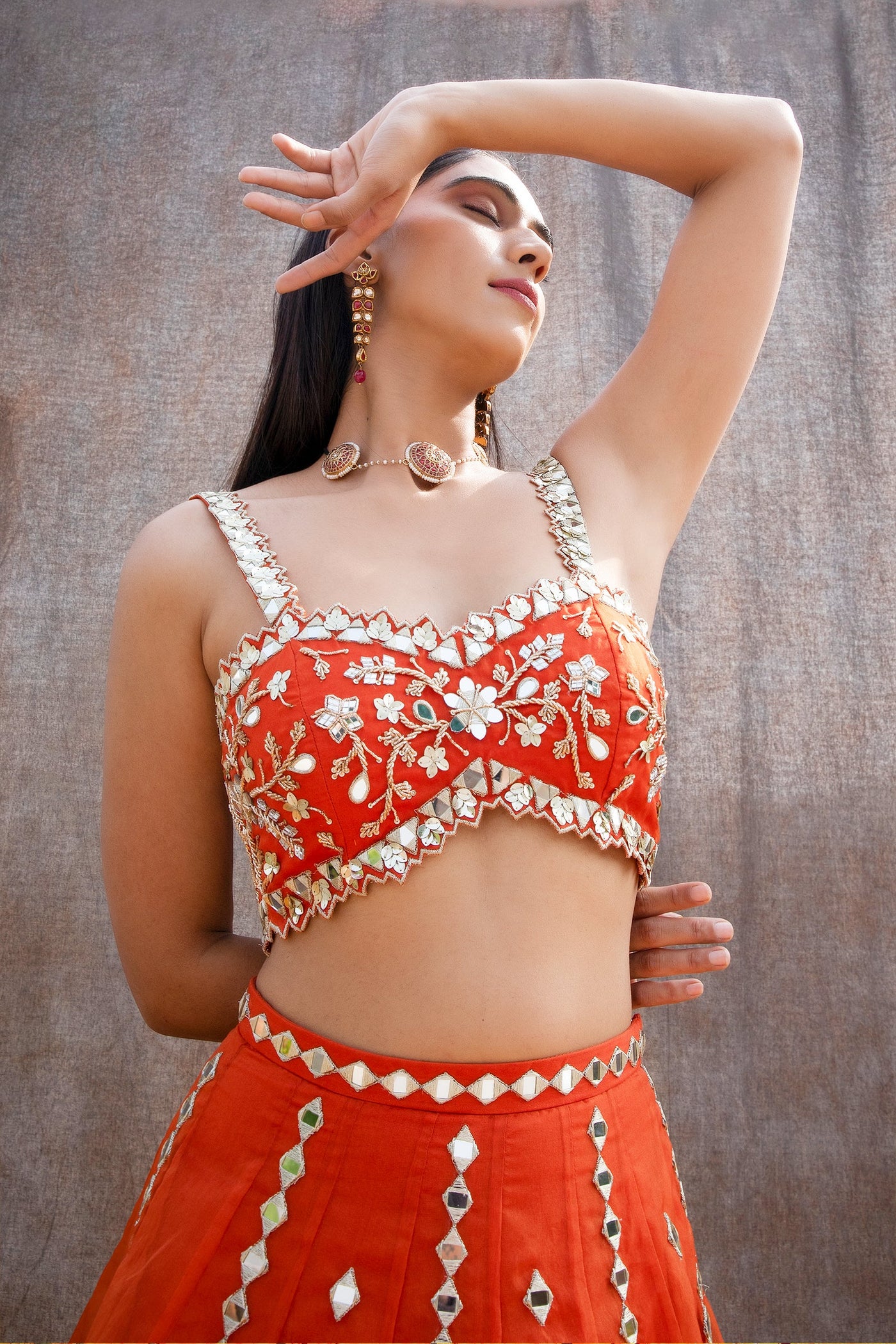 Riya Jain in Mirror Work V-Hem Bustier With High Waist Mirror Lines Lehenga And Embroidered Dupatta