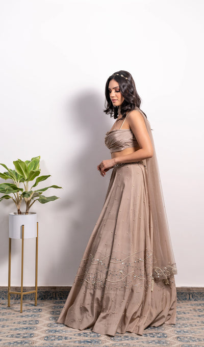 Nishtha Gandhi in Cowl Top With Embroidered Lehenga And Dupatta