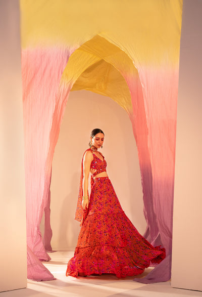 Printed Wrap Around Blouse And 3 Tiered Lehenga With Choker Dupatta