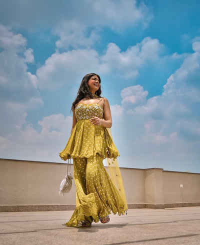Nishtha Gandhi in Mirror Work Corset Peplum And Fit'N'Flare Pant Set In Lurex Georgette With Choker Dupatta