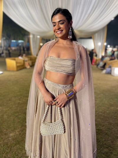 Nishtha Gandhi in Cowl Top With Embroidered Lehenga And Dupatta