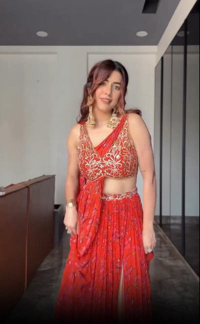 Shreya Arora In V Hem Embroidered Blouse With Drapes And Printed Slit Lehenga