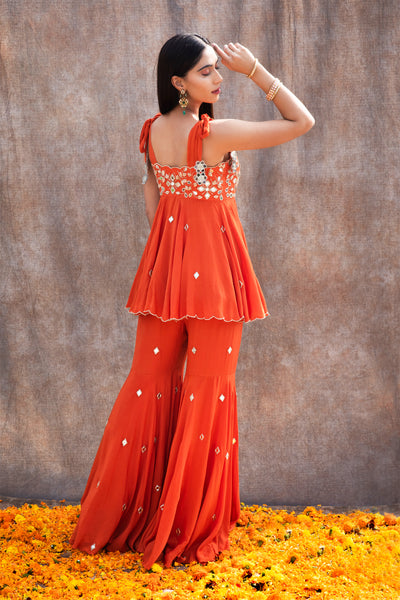 Mirror Work Scalloped Peplum With Tie-Up Straps And Fit'N'Flare Pant Set